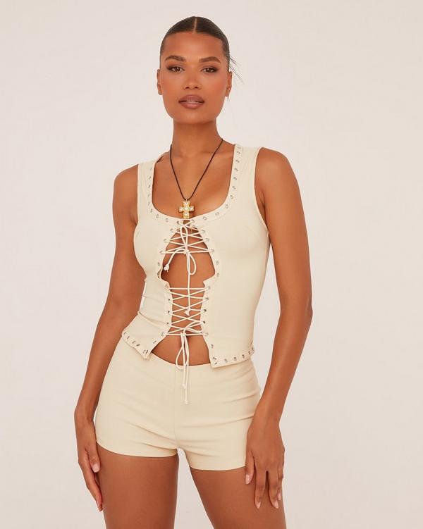 Sleeveless Eyelet Detail Tie Front Top In Stone Woven