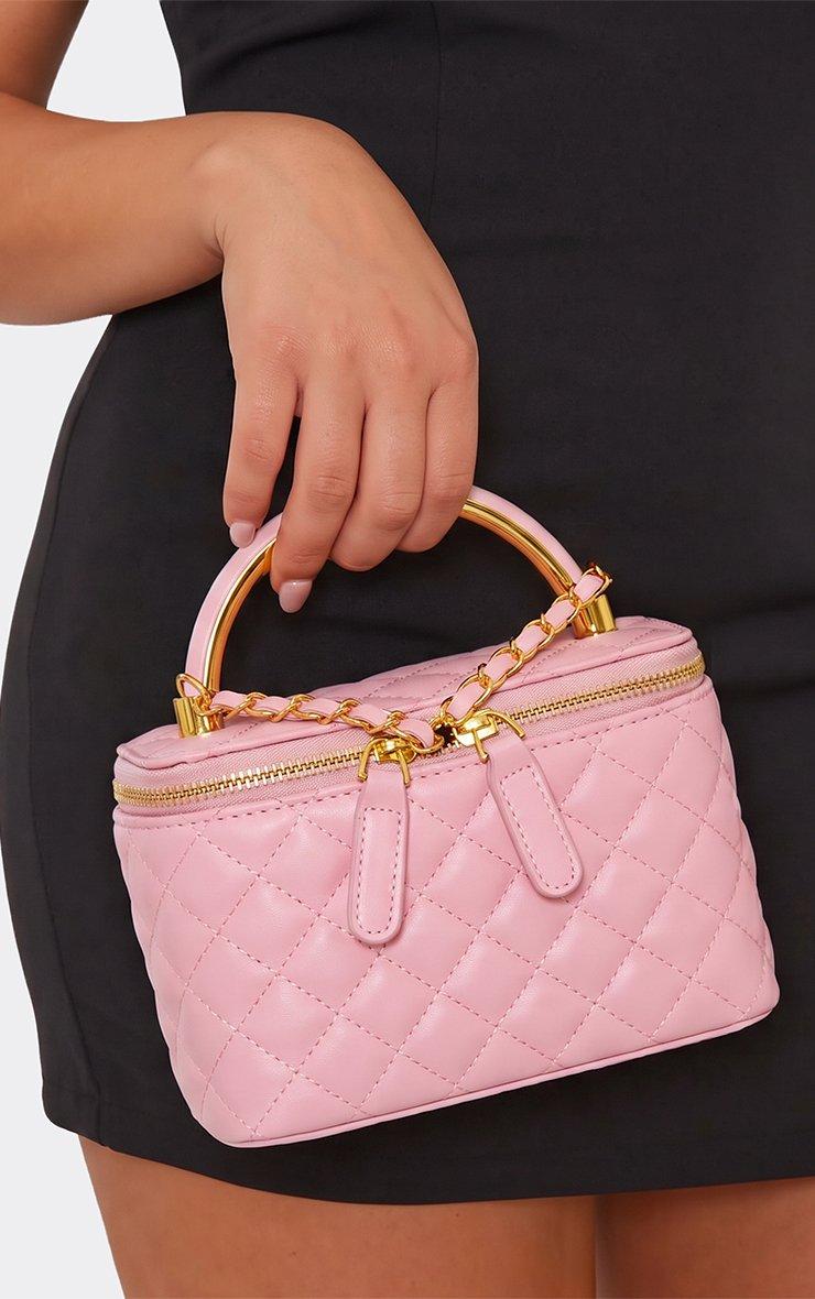Julez Zip Detail Vanity Bag In Pink Quilted Faux Leather.