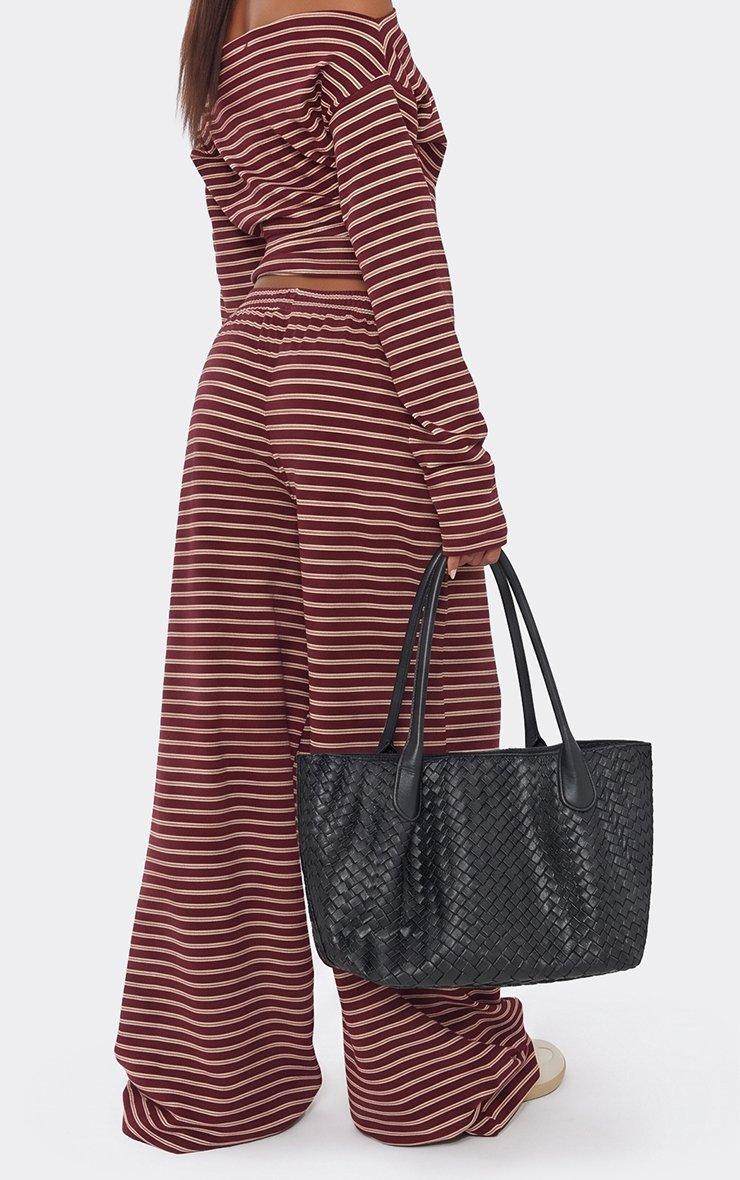 Birdie Woven Detail Shaped Mini Tote Bag In Black Faux Leather.