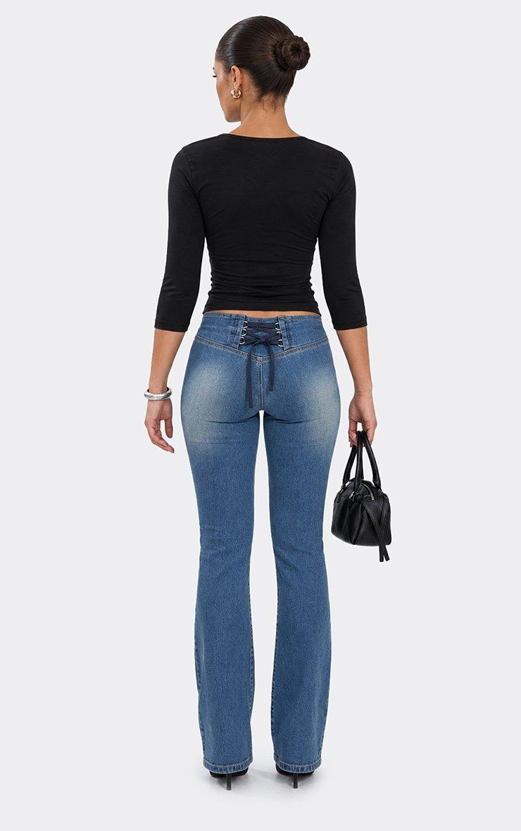 Low Rise Lace Up Back Skinny Straight Leg Jeans In Mid Blue Denim