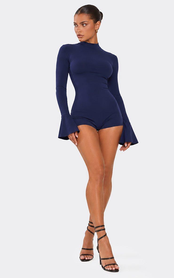 Long Flute Sleeve Playsuit In Navy Slinky