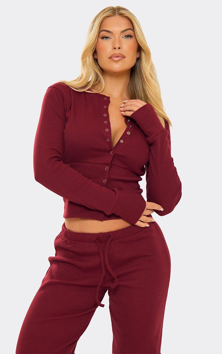 Long Sleeve Button Up Front Fitted Top In Burgundy Ribbed.