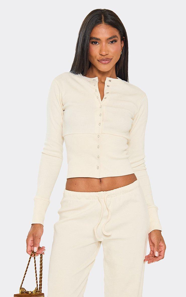 Long Sleeve Button Up Fitted Top In Cream Ribbed.