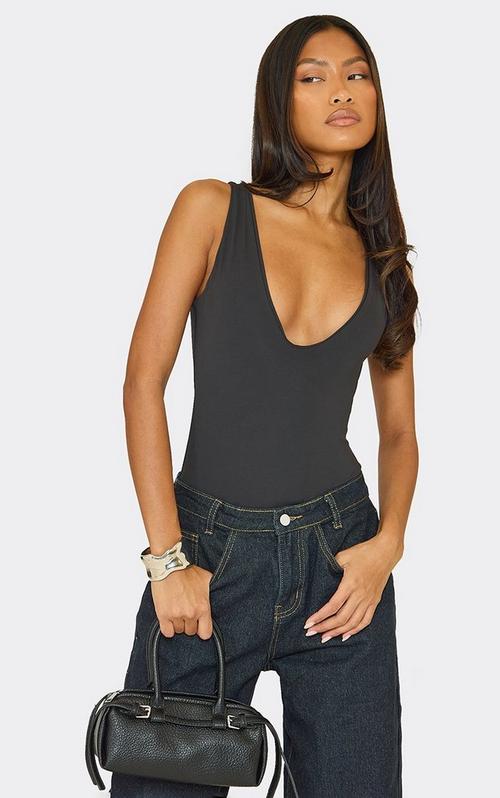 Plunge Extreme Ladder Detail Open Back Bodysuit In Black Woven