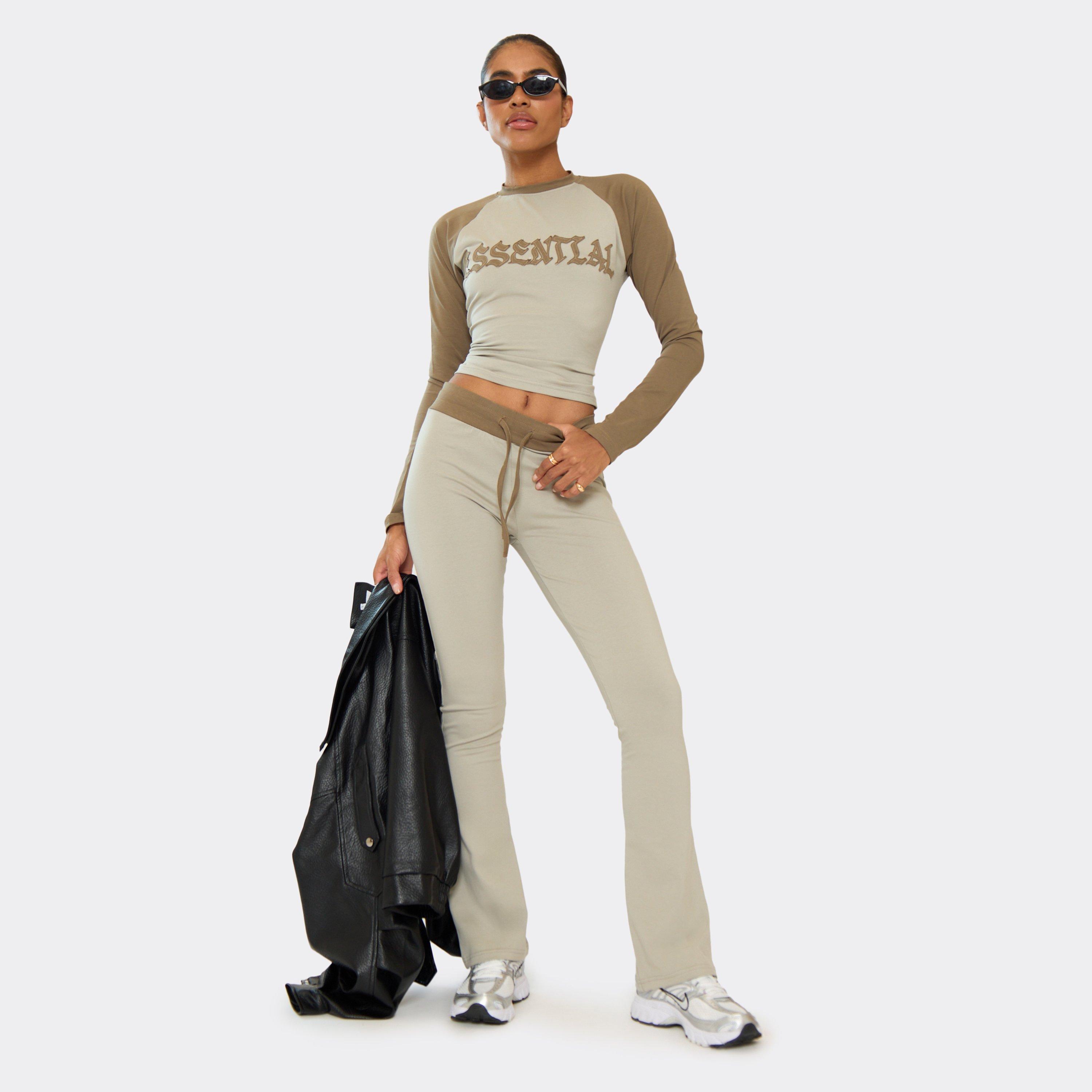 Image of Low Rise Distressed Graphic Detail Flared Leg Trousers In Khaki Green, Women's