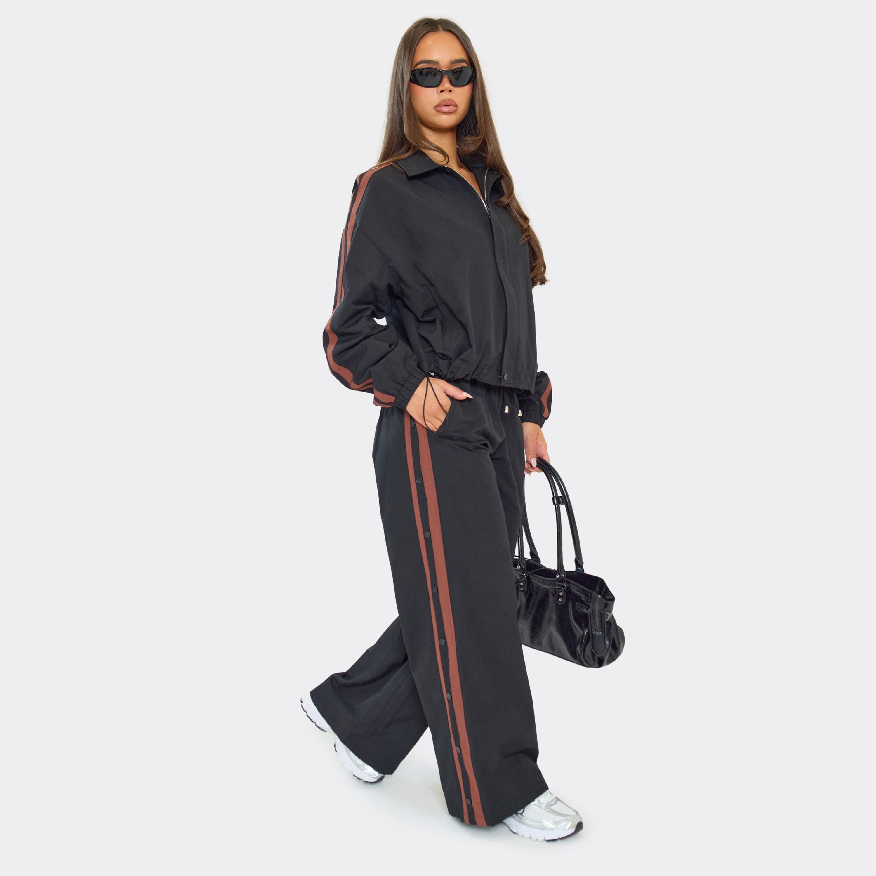 Image of Low Rise Contrast Stripe Popper Detail Trousers In Black Shell, Women's