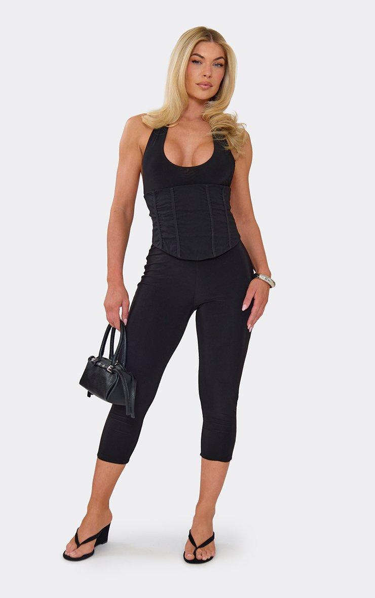 Halterneck Plunge Front Corseted Capri Jumpsuit In Black