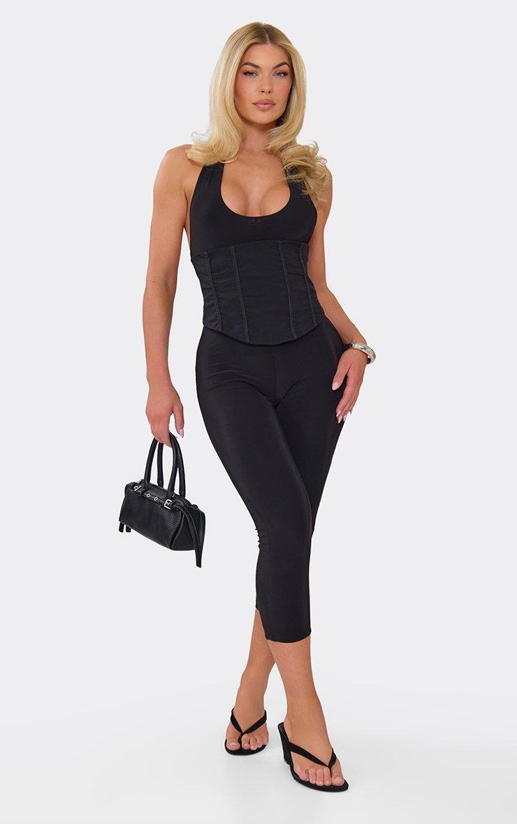 Halterneck Plunge Front Corseted Capri Jumpsuit In Black