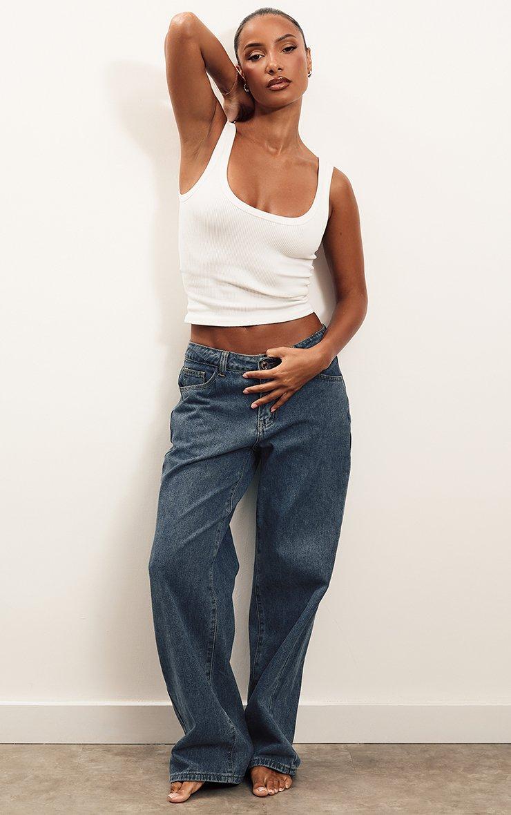 Low Rise Straight Leg Jeans In Mid Blue Denim.