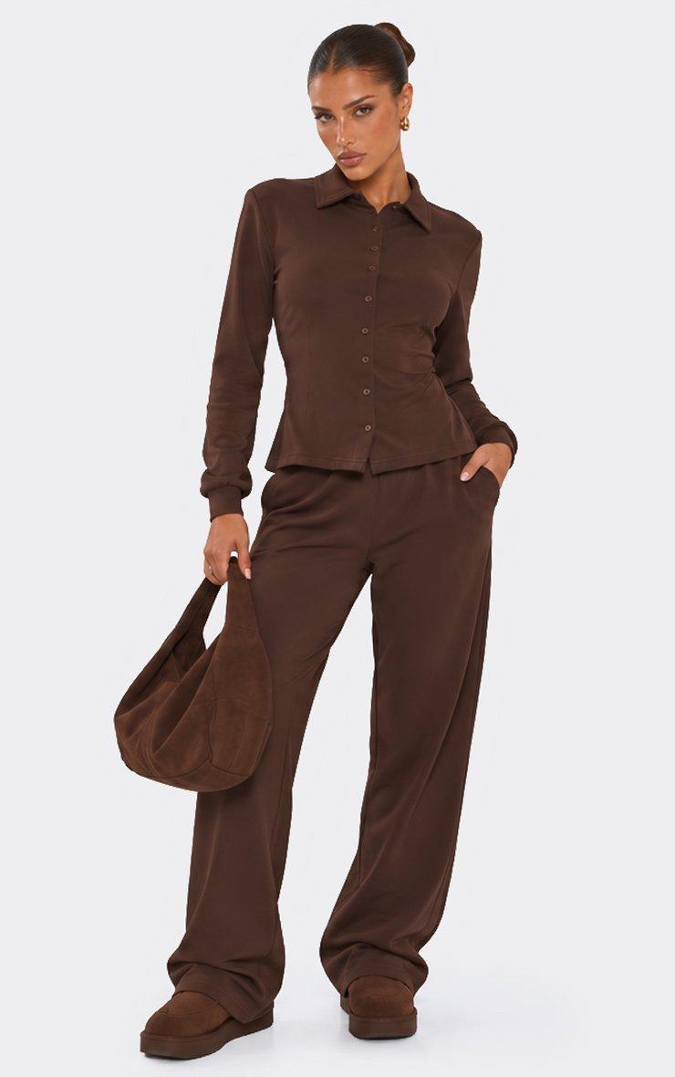 Short Sleeve Button Up Front Tie Back Top In Chocolate Brown Interlock