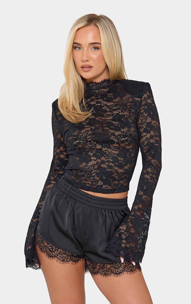 Long Sleeve High Neck Shoulder Pad Top In Black Lace