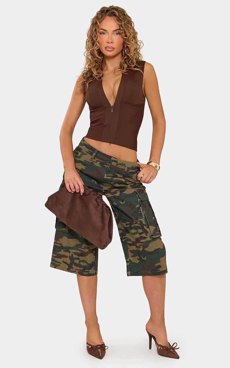 Low Rise Cargo Jorts In Green Camo Print Denim.