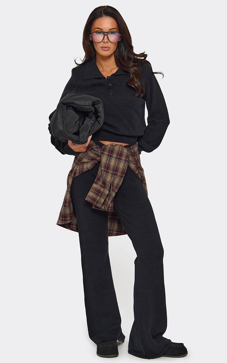 Low Rise Flared Leg Trousers In Black Knit