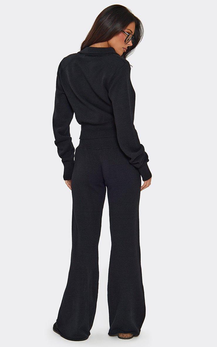 Low Rise Flared Leg Trousers In Black Knit
