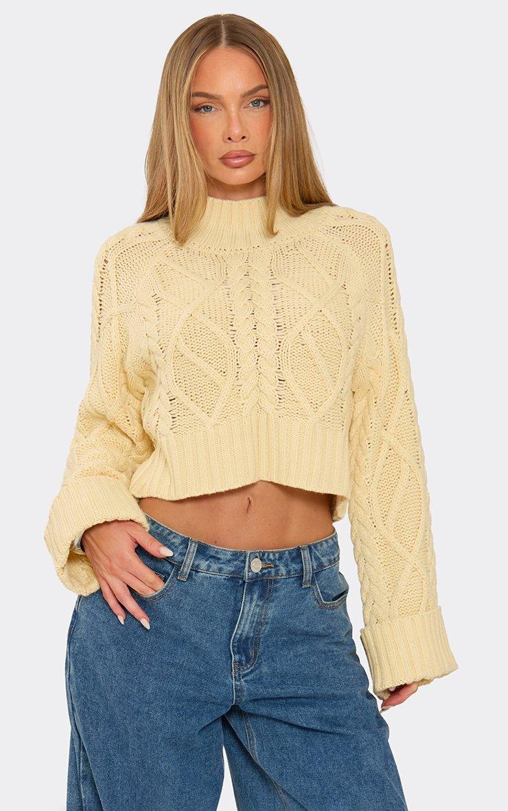 Long Turn Up Sleeve High Neck Jumper In Cream Cable Knit
