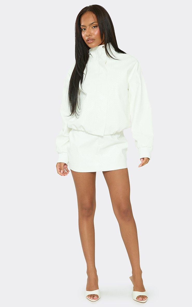Mid Rise Mini Skirt In White Woven Faux Leather