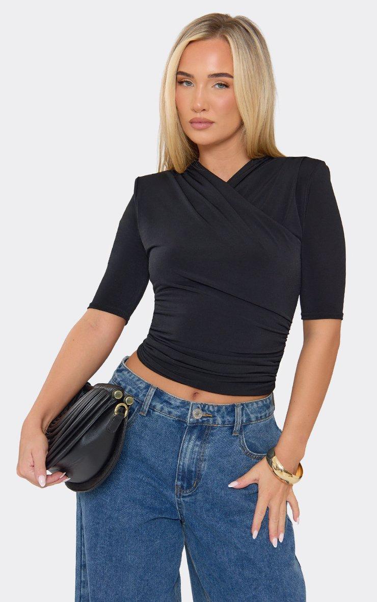 Short Sleeve Cross Over Front Shoulder Padded Top In Black