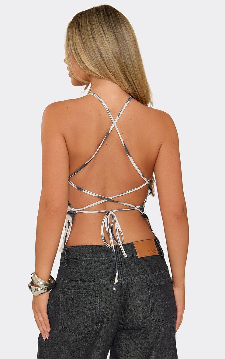 Sleeveless Tie Back Racer Top In Zebra Print.