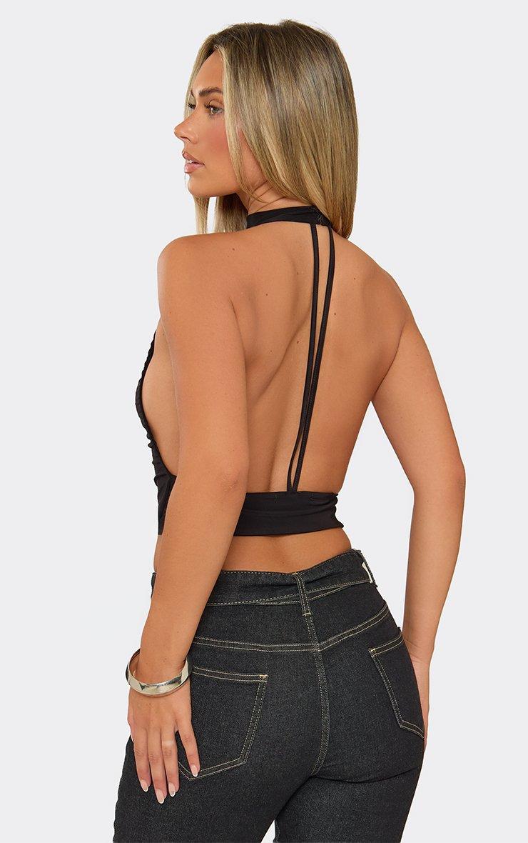 High Neck Strappy Open Back Top In Black Slinky.