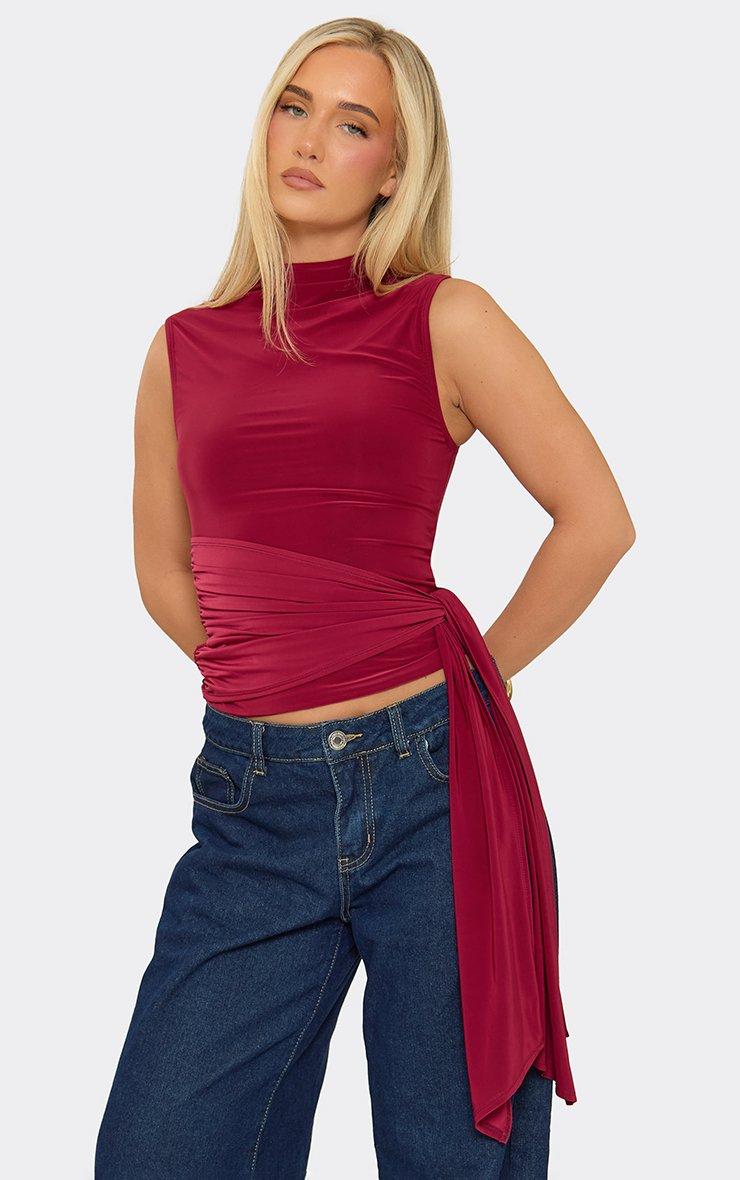 Sleeveless High Neck Tie Drape Front Top In Burgundy Slinky