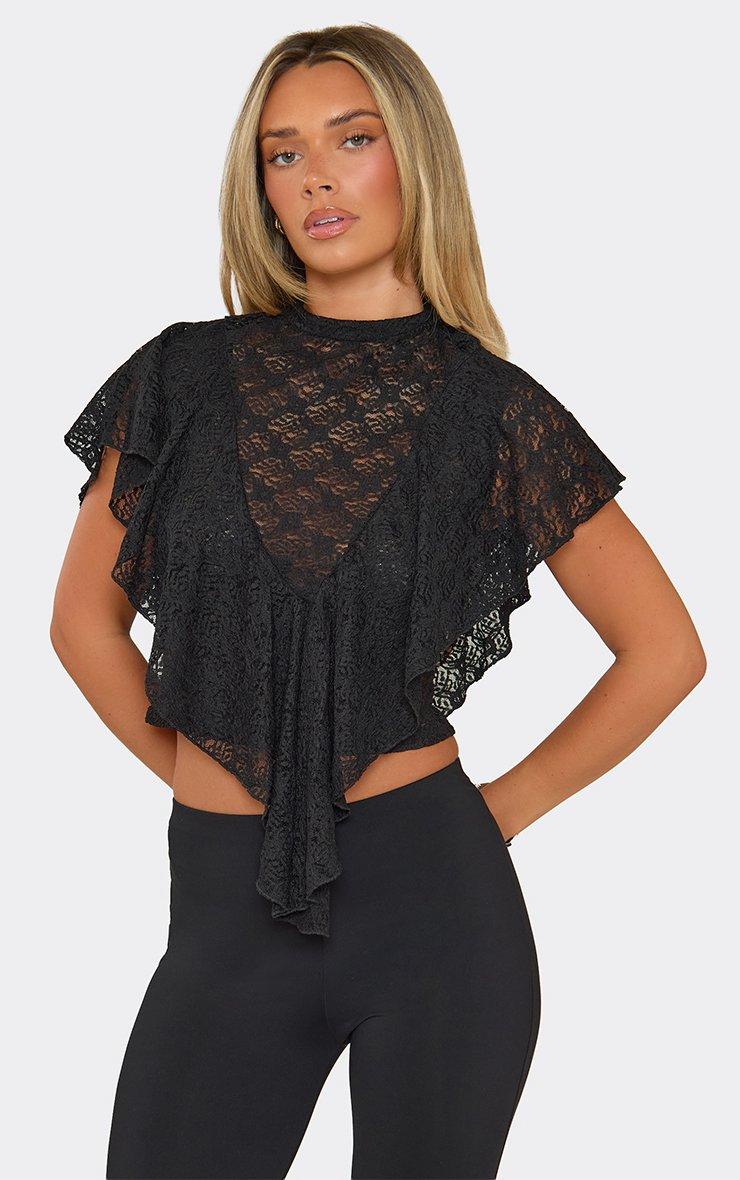 Short Sleeve Frill Hem Top In Black Lace.