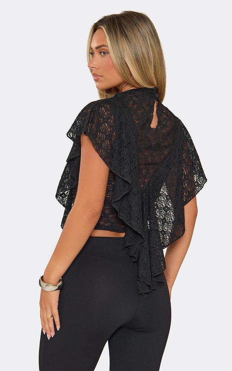 Short Sleeve Frill Hem Top In Black Lace.