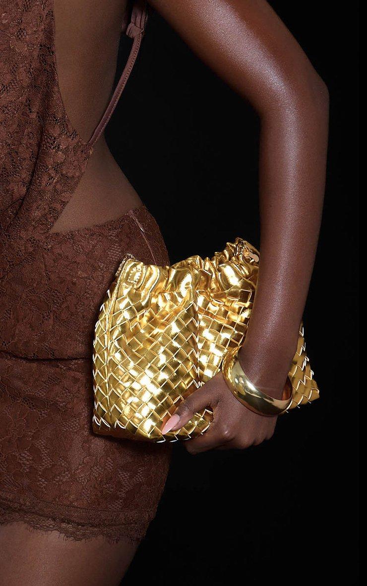 Linden Embossed Detail Oversized Clutch Bag In Gold Faux Leather