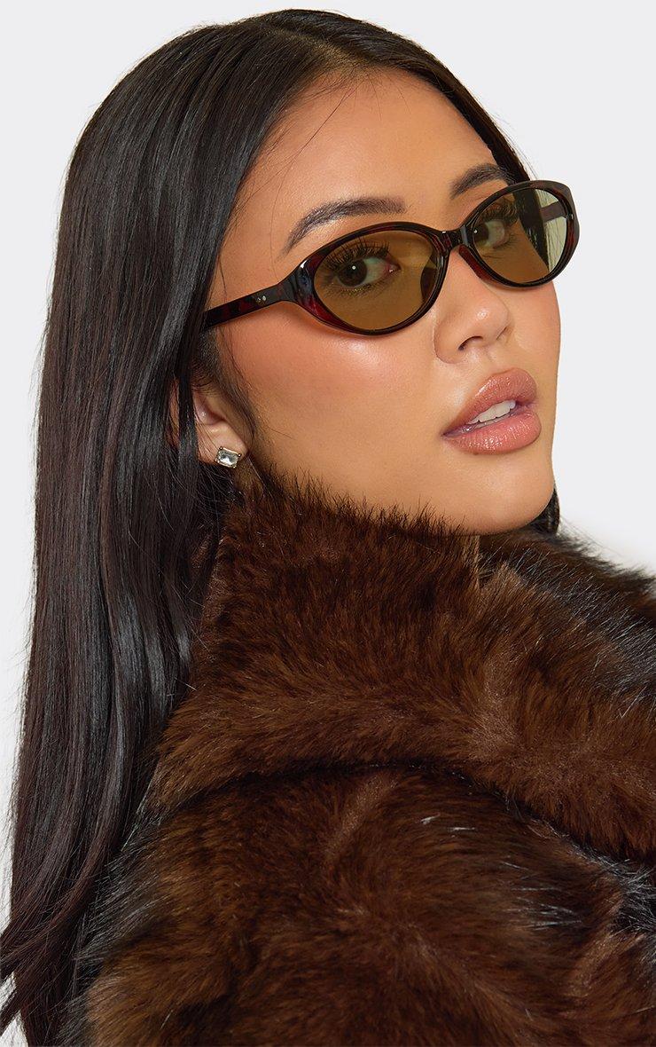 Thin Frame Tinted Lense Oval Shaped Sunglasses In Black