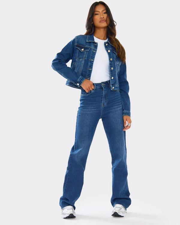 Mid Rise Wide Leg Jeans In Mid Blue Denim