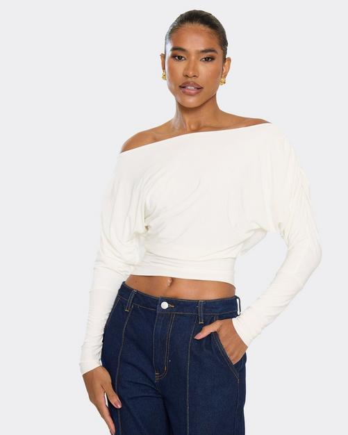 Long Sleeve Asymmetric Slash Neck Top In White Slinky