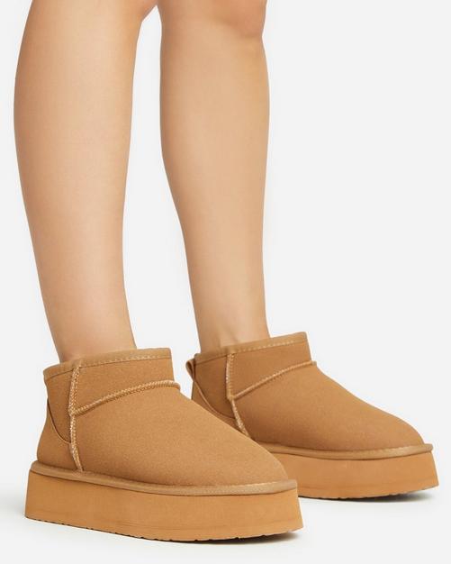 Flat long boots sale best sale