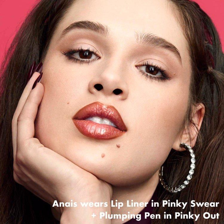 Anais wears Lip Liner in Dark Cocoa + Lip Oil in Honey Talks