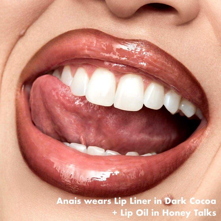 Shanese wears Lip Liner in Dark Cocoa + Plumping Pen in Wicked Cherry