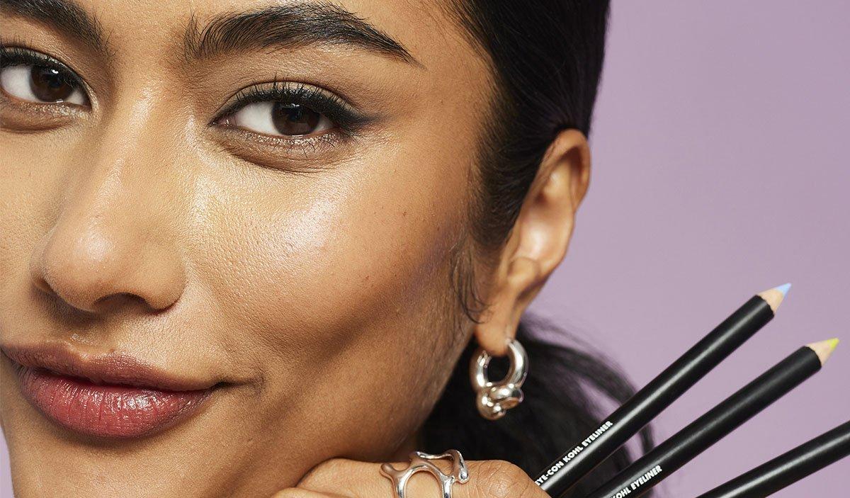 Model with Smokey Eye Holding Kohl Eyeliner