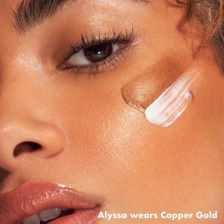 Alyssa wears e.l.f. Bronzing Drops Copper Gold