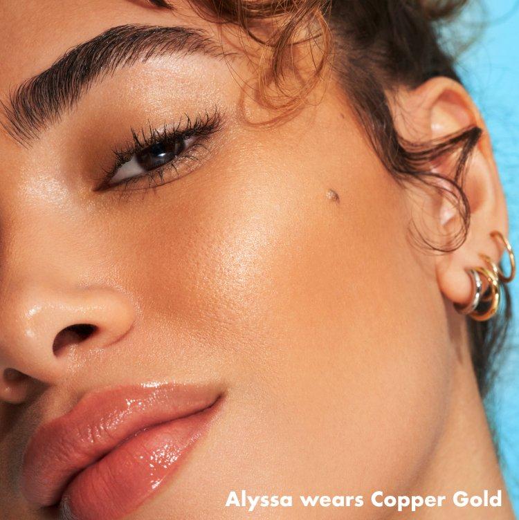 Alyssa wears e.l.f. Bronzing Drops Copper Gold