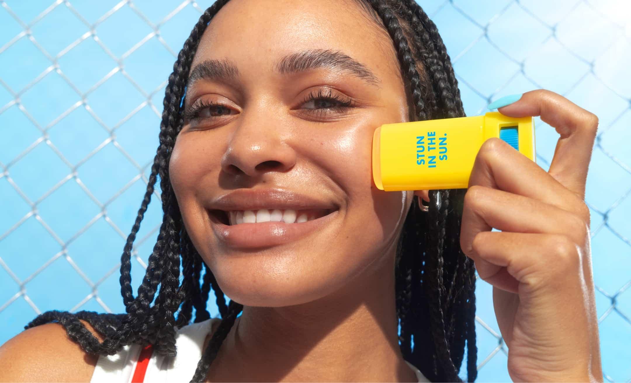 Model using e.l.f. SKIN Suntouchable Invisi-Stick