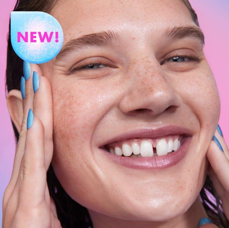 new! A model looking happy using Thirst Burst Drops