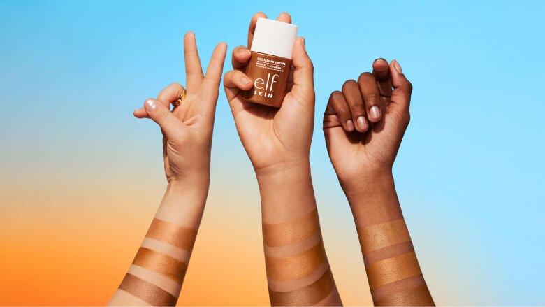 e.l.f. Skin Bronzing Drops applied on three arms with different skin tones