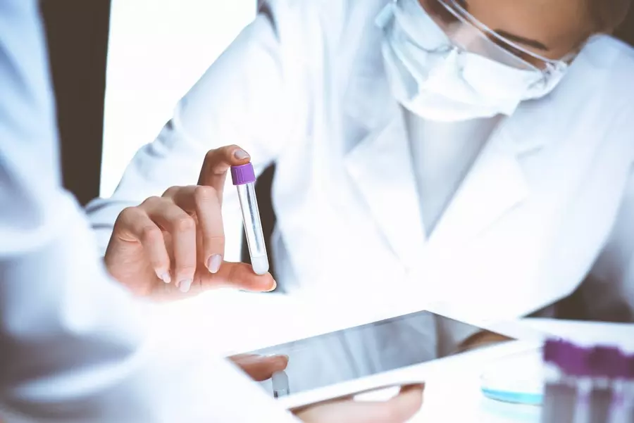 coronavirus pandemic professional female scientist protective eyeglasses researching tube with reagents laboratory concepts medicine virus protection