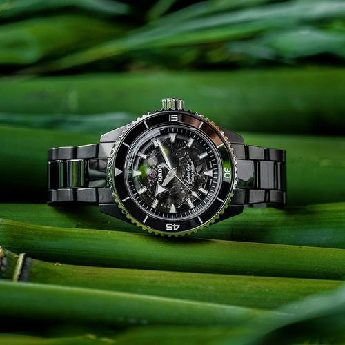 Rado black watch on green bamboo