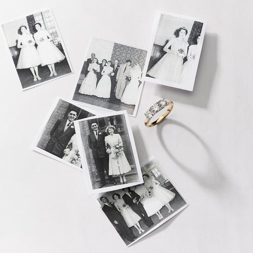 Old photographs with gold trilogy diamond ring