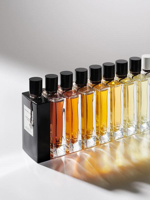 perfume bottles lined up together
