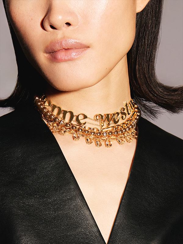 Woman with vivienne westwood gold choker