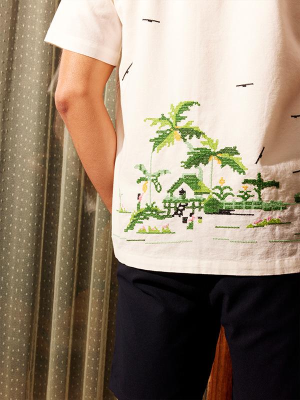 man in embroidered shirt
