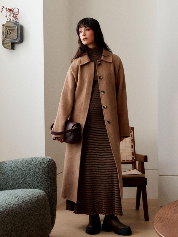 lady wearing brown coat