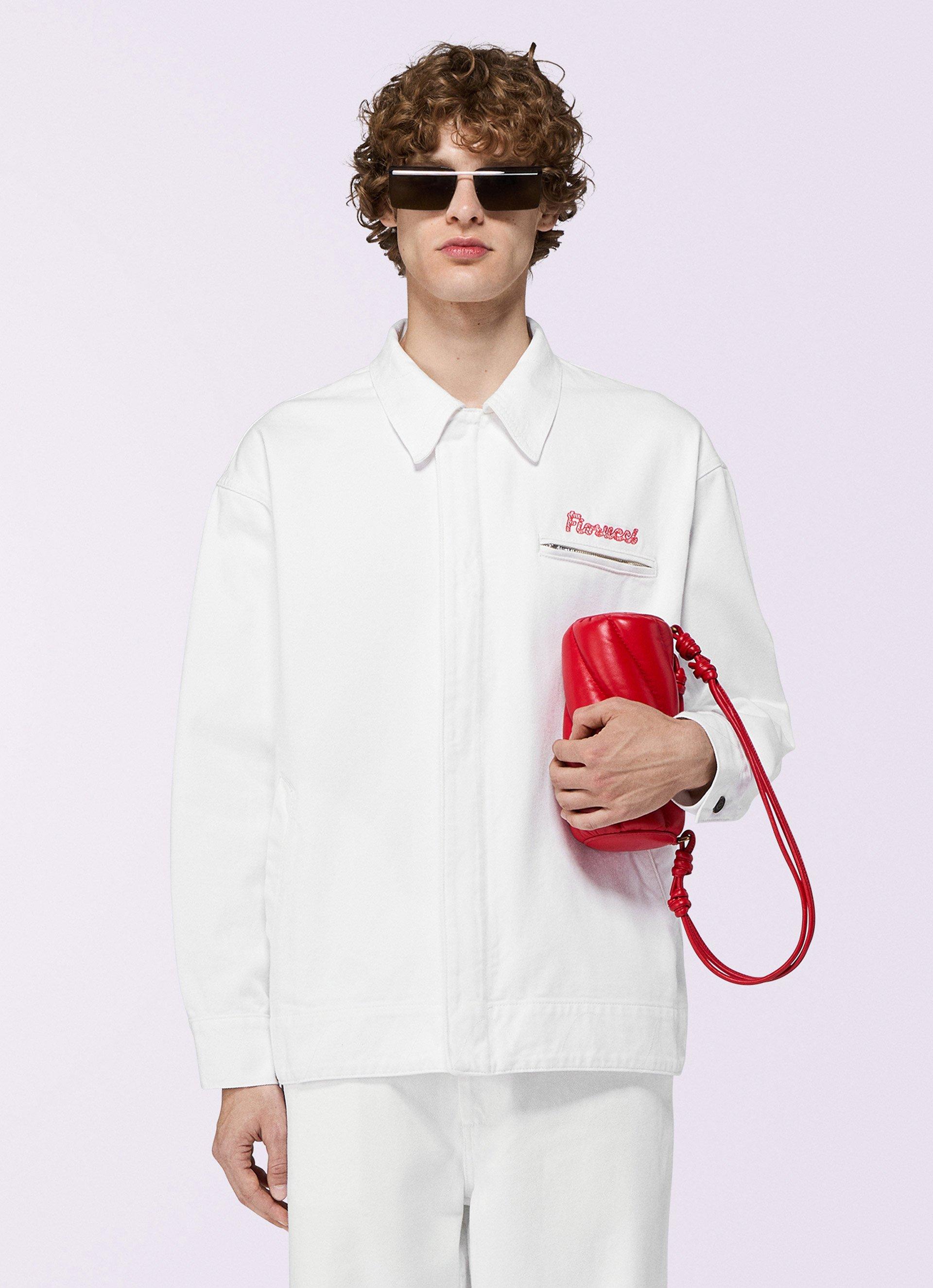 Model wears the Candy Logo Jacket in white.