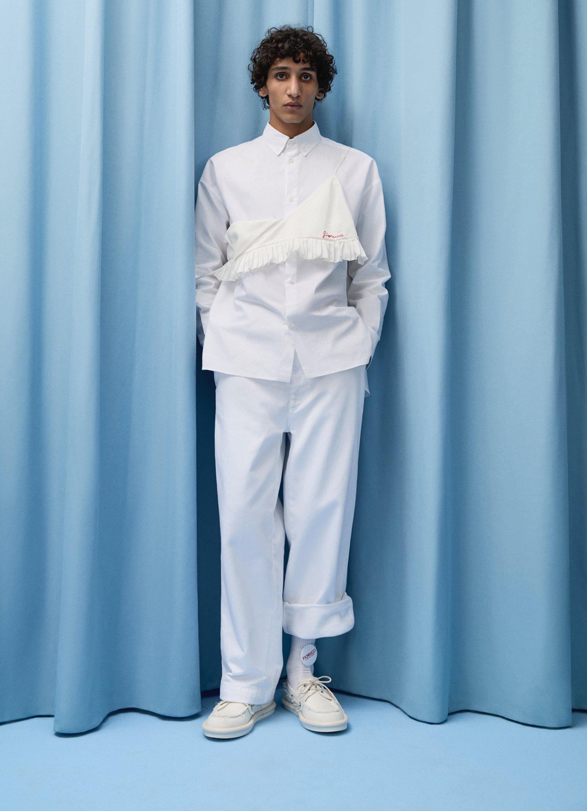 Model wears the Candy Logo Jacket and the Candy Logo Trousers.