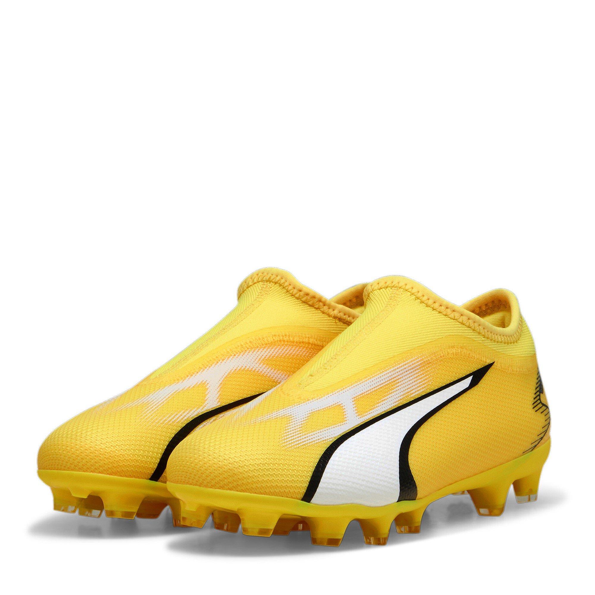 Black and yellow puma football boots online