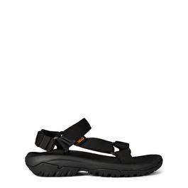 Teva You are looking for a minimalist shoe that is great for both dressing up and dressing down
